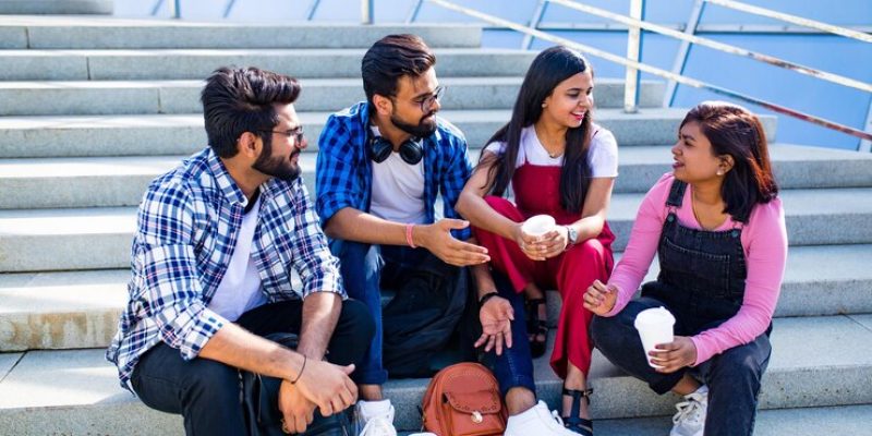 indian-students-keeping-distance-home-work-outdoors_175356-9768